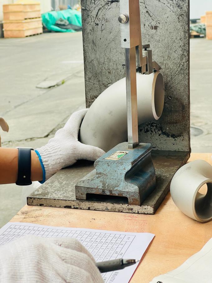 Stainless steel 90° elbow fitting - close-up view